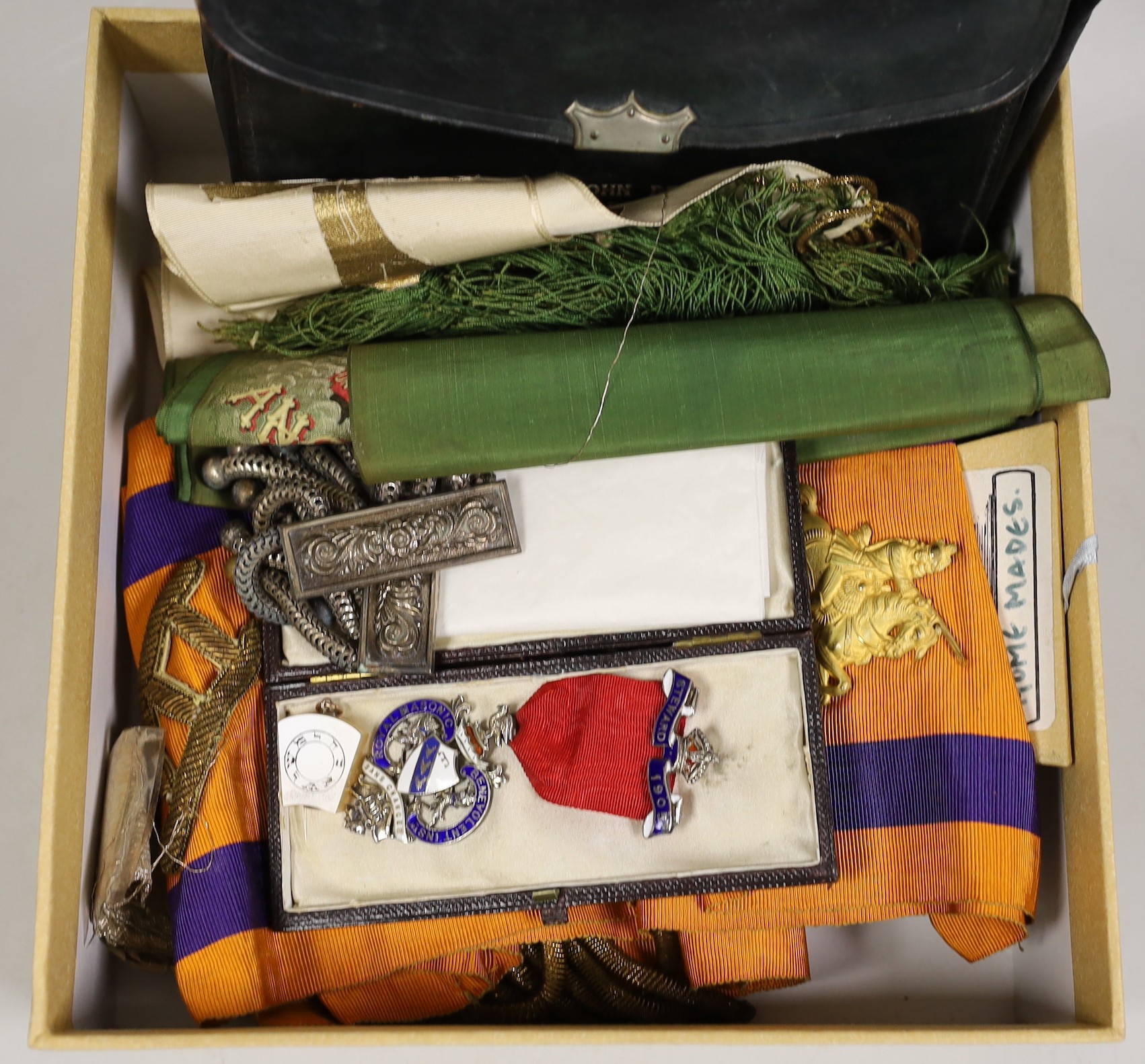 A Masonic silver jewel, various sashes, epaulette’s etc